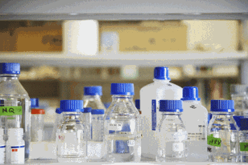 chemical containers bottles in laboratory setting